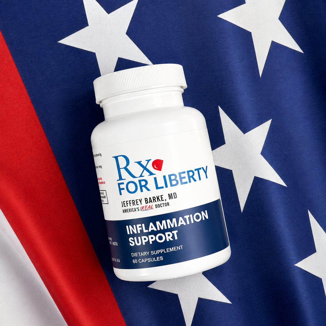 A white bottle of Rx FOR LIBERTY Inflammation Support dietary supplement capsules, positioned diagonally against a draped American flag background.